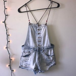 Denim, short overalls.